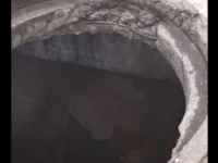 В подземном колодце на Маршала Конева живут люди и не закрывают люк - новости ТИА
